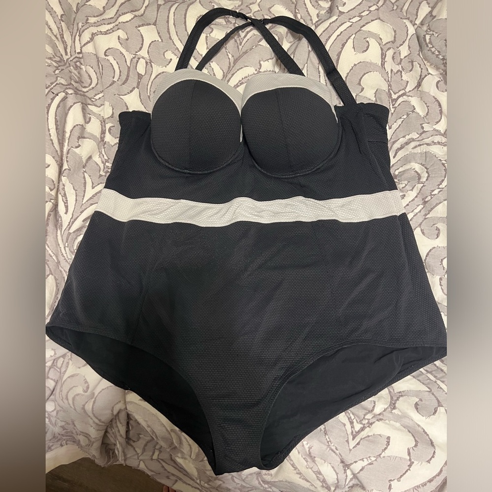 Torrid size 3 swim suit. GUC. There is a little wear pictured.